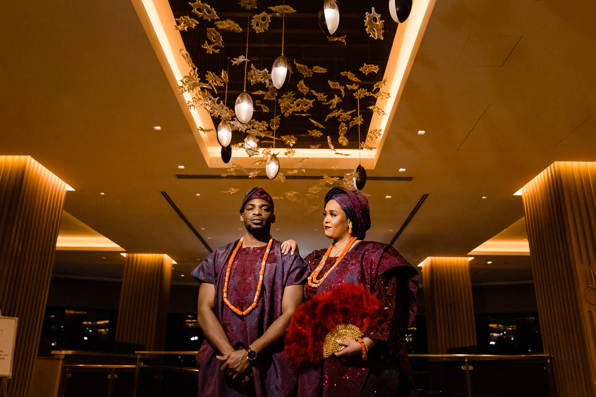 Couple poses for photo at the Four Seasons Hotel for their wedding taken by Austin wedding photographer john winters